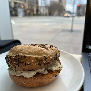 Charred Scallion Cream Cheese with an Everything Bagel! Delicious/best cream cheese I've ever had. (They have a vegan cream cheese too)