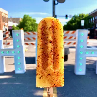 There's little to say about the perfection that is our Chile Lime Pineapple Mango popsicle.