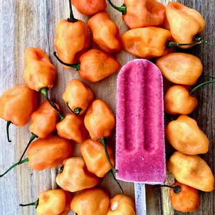 A beautiful blend of hot and old in this amazing strawberry habanero popsicle. OKC popsicle and ice cream a go-go