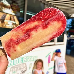Our peach banana with raspberry swirl all natural fruit popsicle