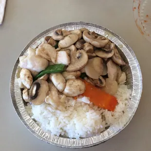 a bowl of rice and mushrooms