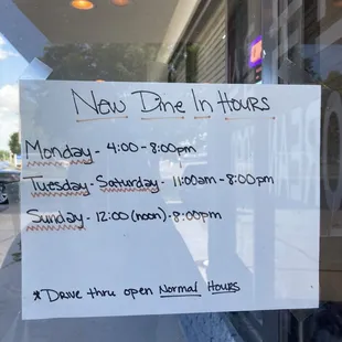 a sign in the window of a restaurant