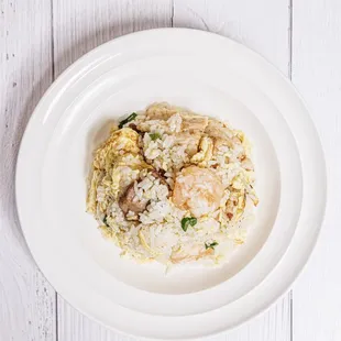 a plate of food on a white table