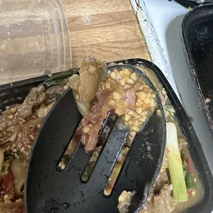 a fork in a wok