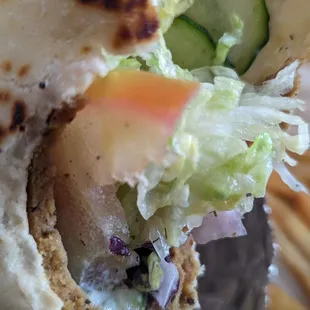 a close up of a pita sandwich