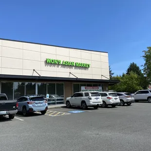 cars parked in front of the store