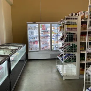 a grocery store with a refrigerator