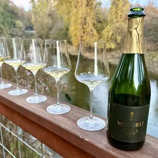Bottle of brut along the river