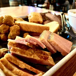 Sliced brisket and ham