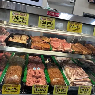a display of meat in a case