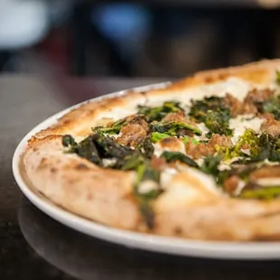 Sausage &amp; Rabe
 sweet Italian sausage + sautéed broccoli rabe + e.v.o.o. + fior di latte