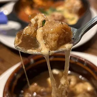 a spoon full of soup