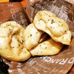 a basket of dumplings on a table