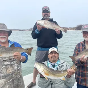 Great repeat customers loading the boat with #redfish that day!