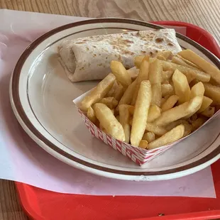 Kids beans and cheese burrito w fries.