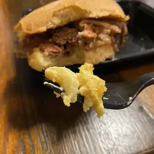 Creamy mac-n-cheese with a pulled pork sandwich