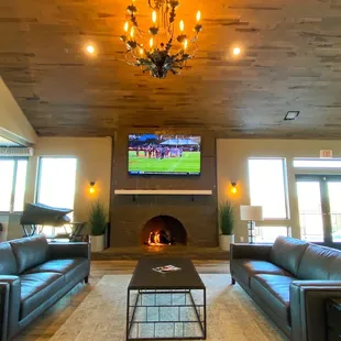 Inviting fireplace for drinks or catch a game.