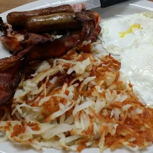 &quot;Meat-Lovers Breakfast&quot; 2 eggs, sasauge links, bacon, 4oz ham slab and hashbrowns. Didn&apos;t have to order them &quot;crispy&quot;.