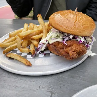 Fried Chicken Sandwich - white American cheese, cole slaw, mild spice aioli, w/ fries