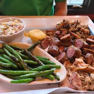 This is the 3 meat platter it comes with 2 sides and corn bread. It was delicious!!!!! I want to be buried with this tray of food. Lmao