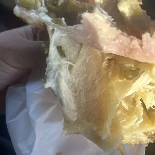 Husband and I got the ham and cheese croissant this morning and after a couple bites on the road we realized it was raw!