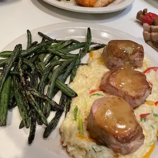 Pork medallions with risotto and green beans