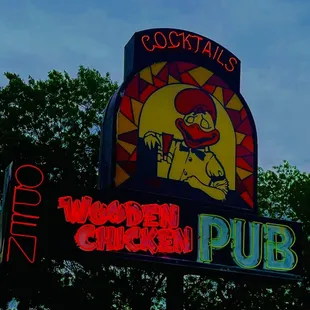 the neon sign for the restaurant