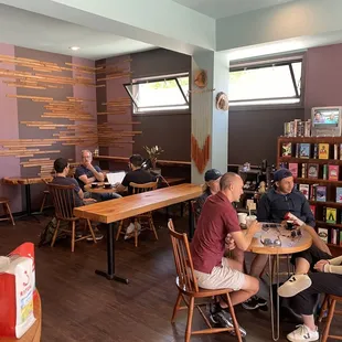 a group of people sitting at tables