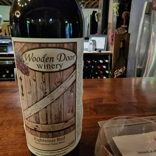 a bottle of wine on a table