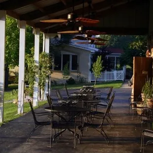 patio area with tables and chairs