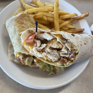 South Carolina chicken wrap (crispy) with coleslaw and dill pickle spear! Great!