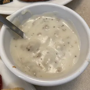A cup of sausage gravy