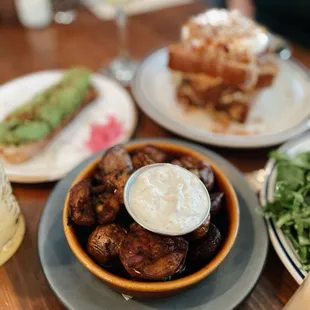 Side of potatoes with dipping sauce