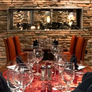 a table with wine glasses on it