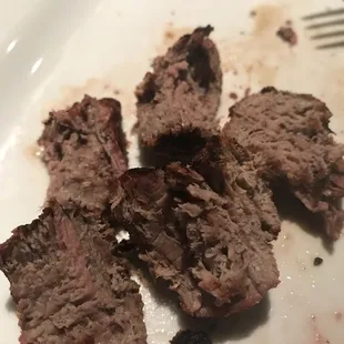 Almost half of my "medium-rare" filet mignon.