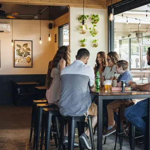 a group of people sitting at a table