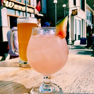 a glass of watermelon juice and a glass of watermelon juice