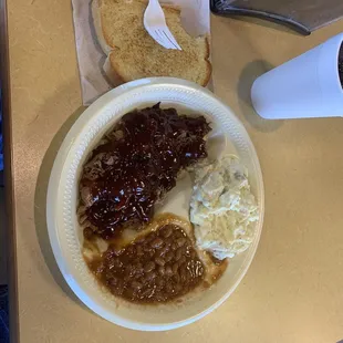 One meat with potato salad and baked beans