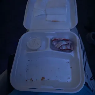 a tray of food and a napkin