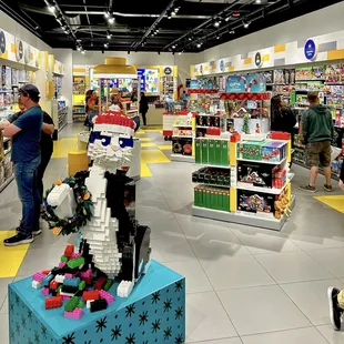 With its open play trays of Lego bricks, the  Lego store is a place to occupy children.
