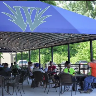 Our covered patio is the perfect place to hang out before a volleyball game (Outside)