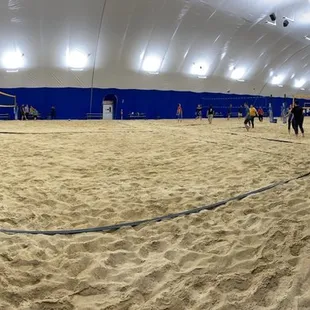 The volleyball dome has 6 courts and a makeshift bar inside. No bathroom, your ears pop, and the sand is icyyyyy cold.