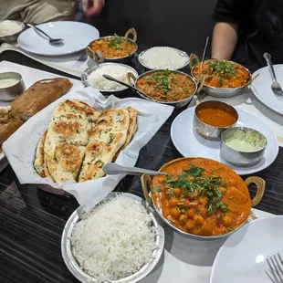 Our spread! Aloo Channa Chana Masala Garlic Naan Onion Masala Dosai Pesarat Uppuma Special Vegetable Curry