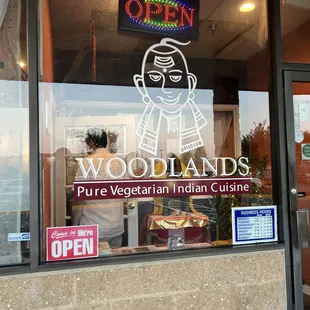 a sign in the window