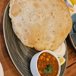 a plate of food on a wooden table