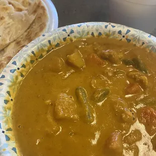 Vegetable curry, white rice, chapati (bread)