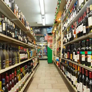 rows of wine bottles in a store