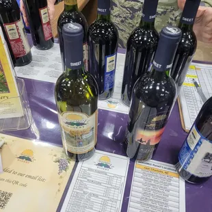 several bottles of wine on a table