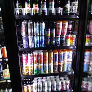 a refrigerator full of sodas