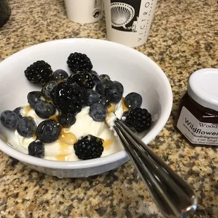 Eating my bounty from the market OMG homemade yogurt w/blueberries and THIS amazing wild honey..going to buy a bigger jar!